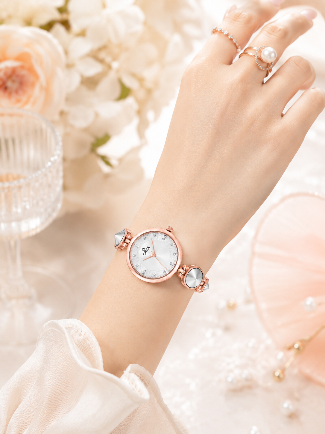 Onex Women’s Rose Gold Designer Bracelet Watch with Silver Textured Dial