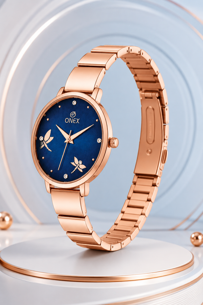 Onex Women’s Rose Gold Bracelet Watch with Crystal Markers & Dragonfly Dial