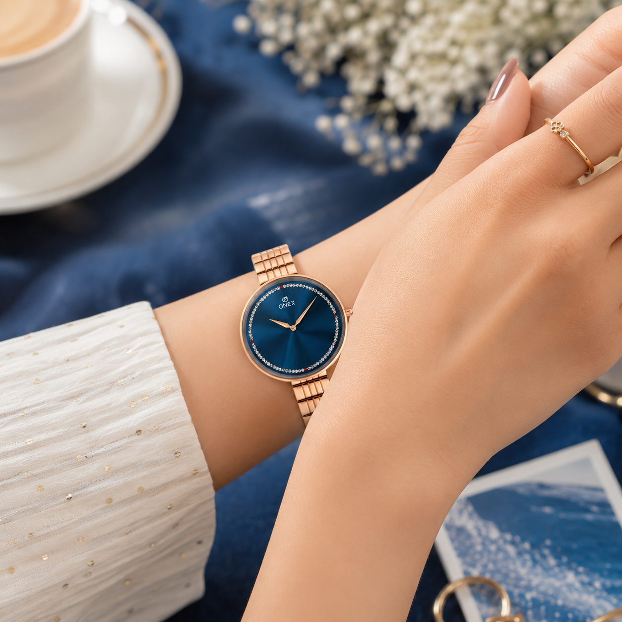 ONEX Elegant Rose Gold Women’s Watch | Blue Sunray Dial with Crystal Ring