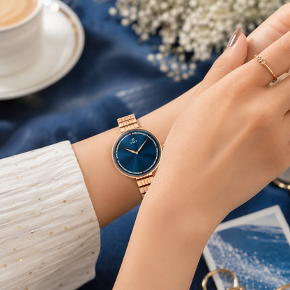ONEX Elegant Rose Gold Women’s Watch | Blue Sunray Dial with Crystal Ring