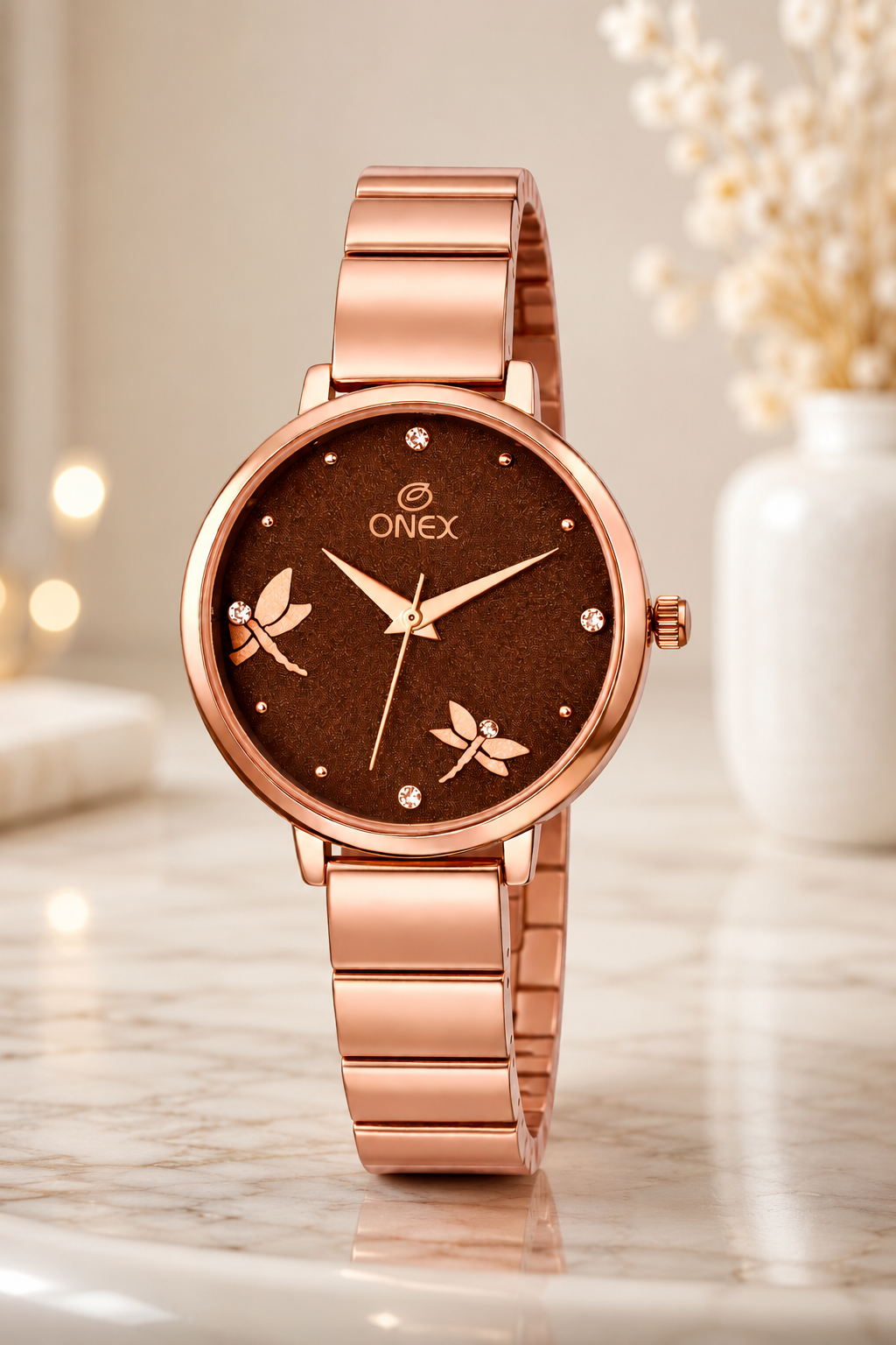 Onex Women’s Rose Gold Bracelet Watch with Crystal Markers & Dragonfly Dial