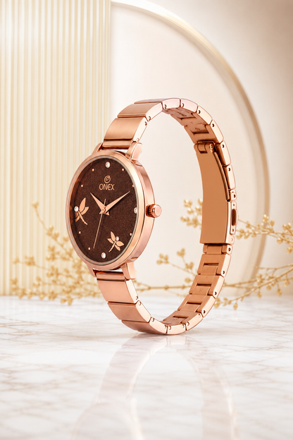 Onex Women’s Rose Gold Bracelet Watch with Crystal Markers & Dragonfly Dial